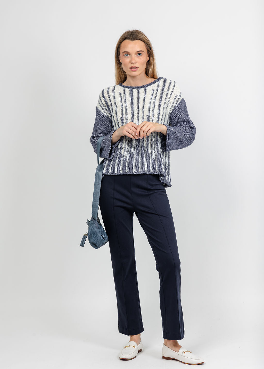Olivia by Habitat Cloud Nine Pullover Sweater in Denim paired with Denim Kick FLare Pant in Navy available at Barbara Katz