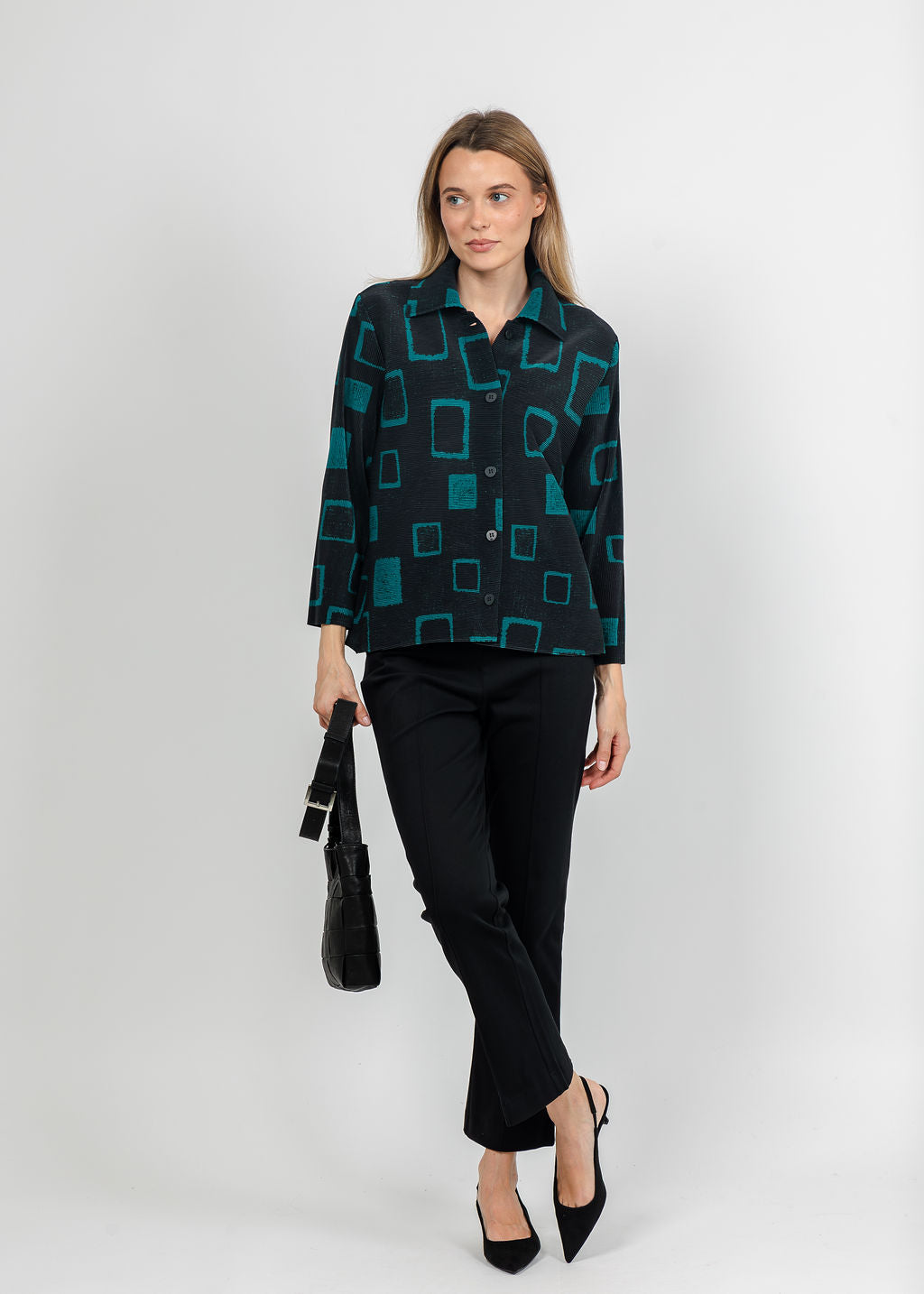 Olivia by Habitat Parisian Pleats Print Night Out Jacket in Teal paired with Knit Denim Kick Flare Pant in Black available at Barbara Katz