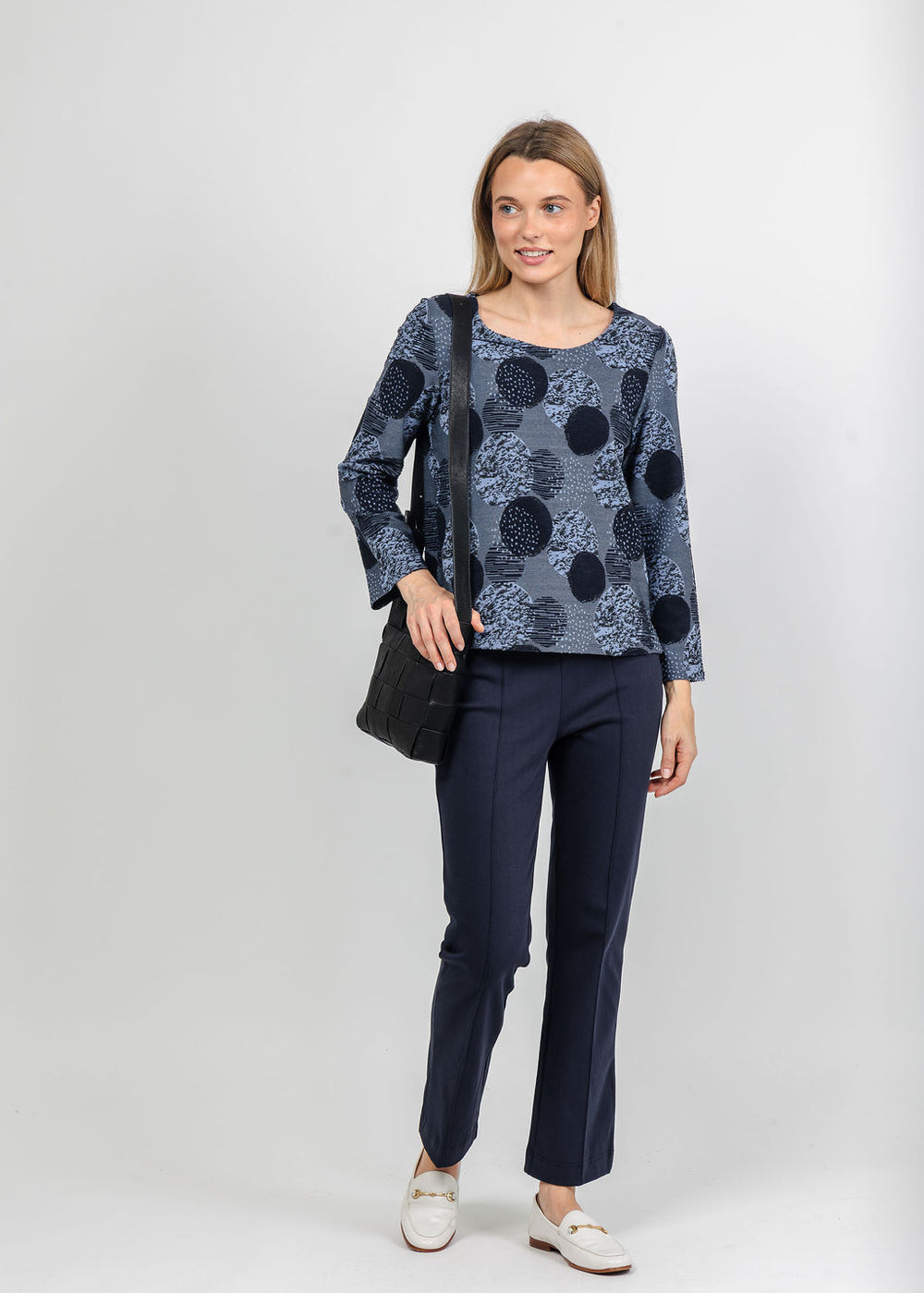 Olivia by Habitat Spotlight Modern Tee in Navy paired with Knit Denim Kick Flare Pant in Navy available at Barbara Katz