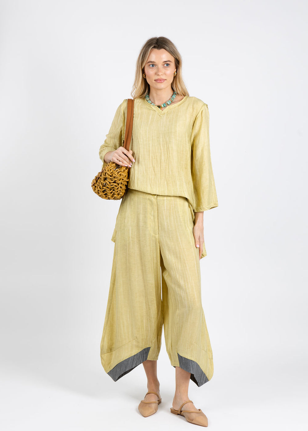 Ozai N Ku Aida V-Neck Tunic in Yellow paired with Ozai N Ku Debbie Pants in Block available at Barbara Katz