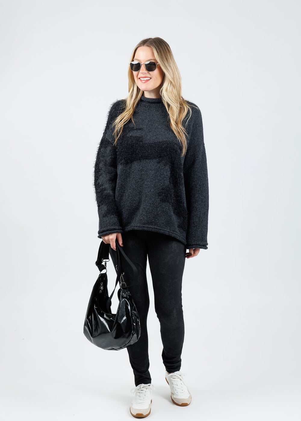Ozai N Ku Lumila Oversized Sweater in Dark Grey paired with Ozai N Ku Jac Leggings in Black available at Barbara Katz