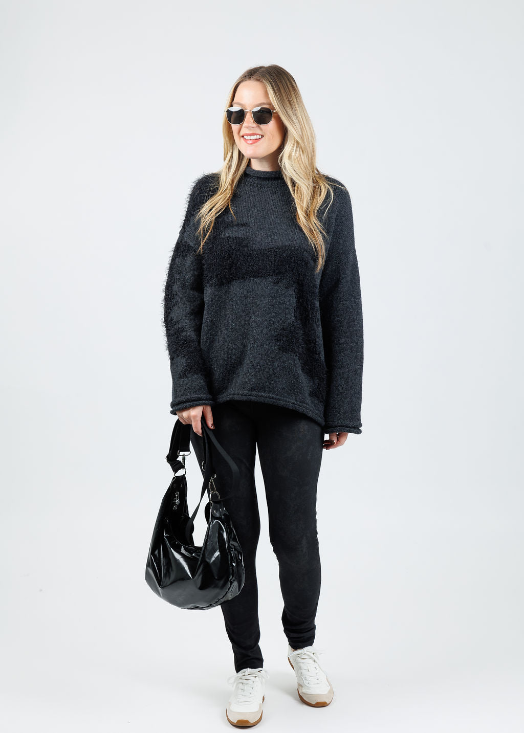Ozai N Ku Lumila Oversized Sweater in Dark Grey paired with Ozai N Ku Jac Leggings in Black available at Barbara Katz