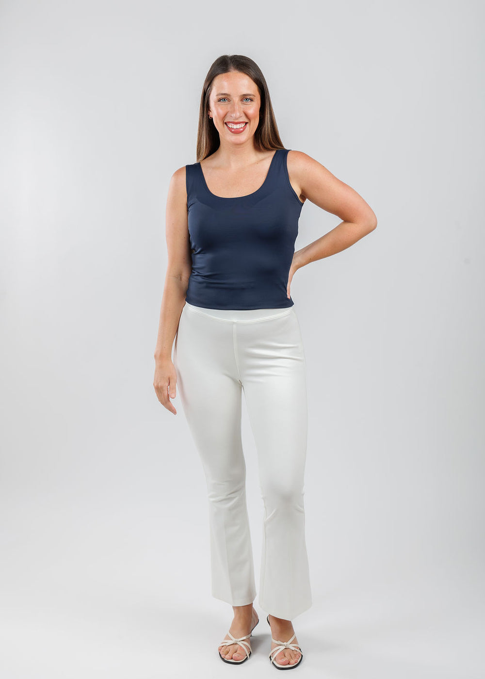 A'nue The Classic Micro Tank Top in Navy paired with Peace of Cloth Ella Paramount Knit Pants in Oyster available at Barbara Katz