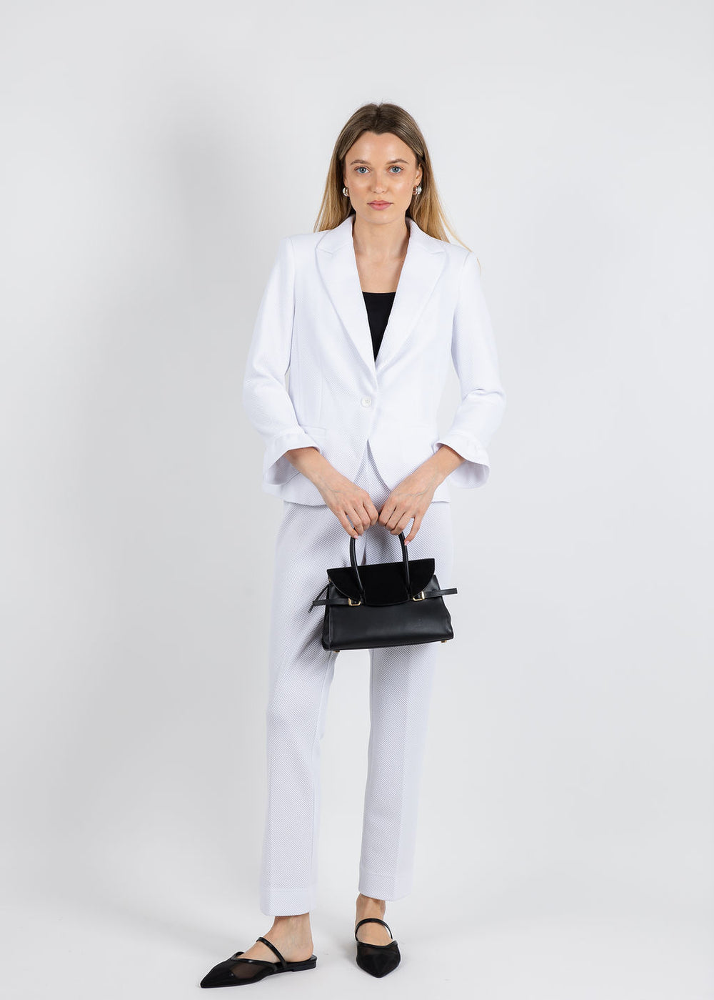 Peace of Cloth Gia Pique Jacket in White paired with matching Peace of Cloth Pique Annie Pants available at Barbara Katz