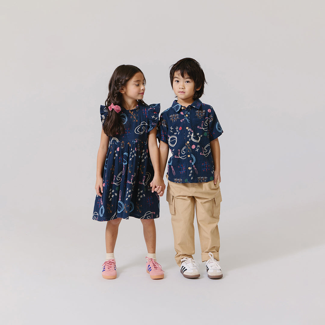 Pink Chicken Girls Jennifer Dress in Tic Tac Toe available at Barbara Katz