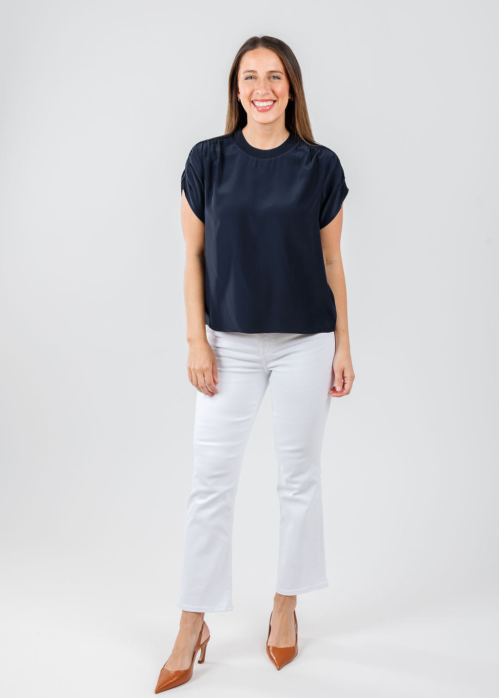 Cinq a Sept Lorraine Top in Navy paired with Pistola Lennon High Rise Crop Boot Jeans in Vivid White available at Barbara Katz
