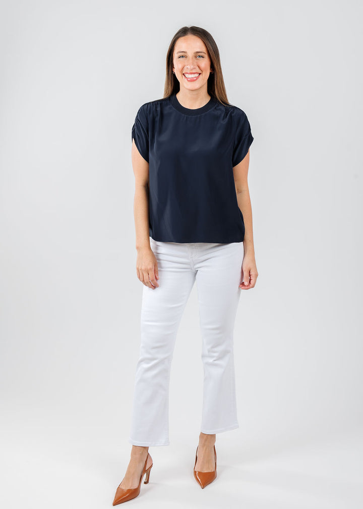 Cinq a Sept Lorraine Top in Navy paired with Pistola Lennon High Rise Crop Boot Jeans in Vivid White available at Barbara Katz