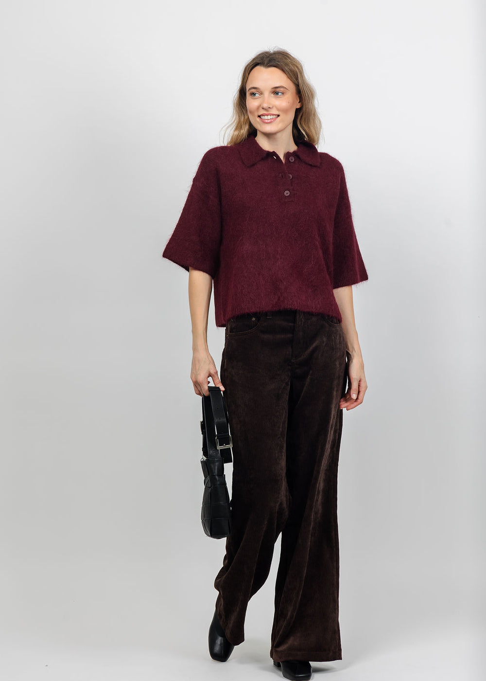 Pistola Nadya Alpaca Blend Boxy Polo Sweater in Cherry Wine paired with Pistola Jadyn Low Slung Palazzo Jeans in Mocha available at Barbara Katz