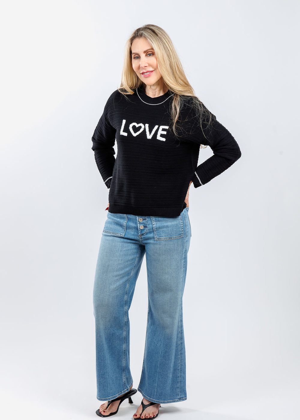 Pure Amici Love Crew Neck Sweater in Black/White paired with Citizens of Humanity Lyra Patch Pocket Jeans in White available at Barbara Katz