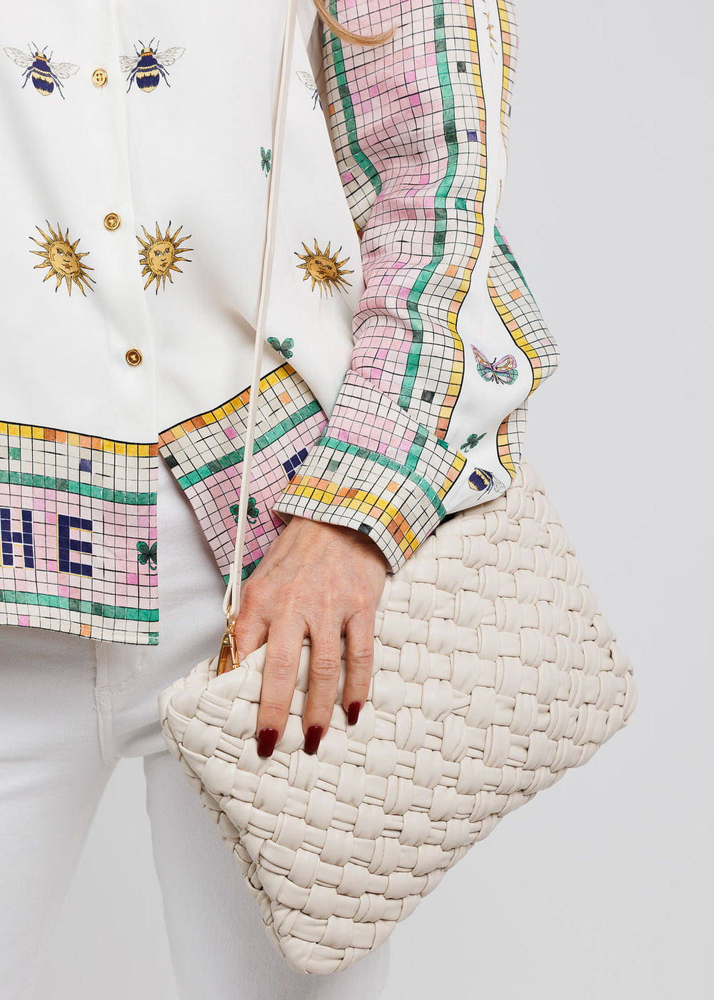 Remi/Reid Nieves Woven Clutch Crossbody Bag in White available at Barbara Katz