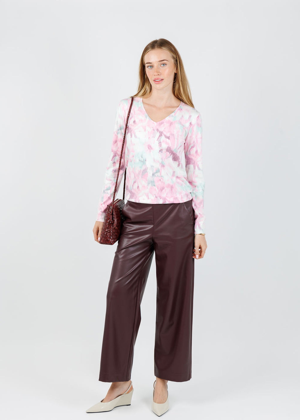 Leo & Ugo Blurred Floral V Neck Sweater in Pink Multi  paired with Raffaello Rossi Palina Vegan Leather 6/8 Culotte Pants in Barolo available at Barbara Katz
