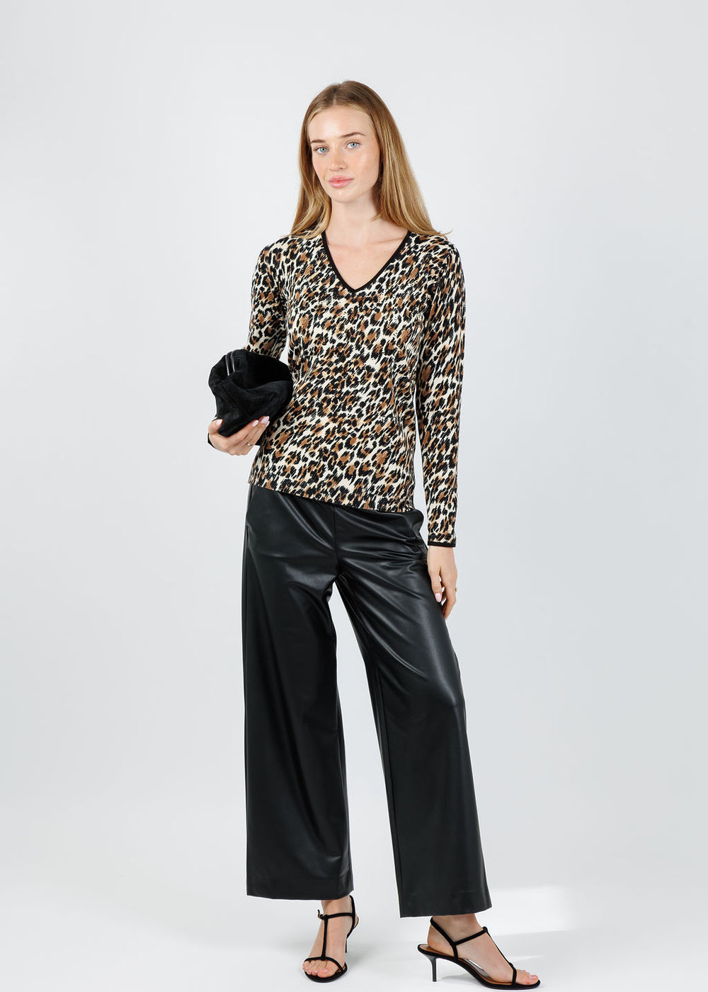 Leo & Ugo Agathe Leopard Sequin V-Neck Sweater in Multicolor paired with Raffaello Rossi Palina Vegan Leather 6/8 Culotte Pants in Black available at Barbara Katz