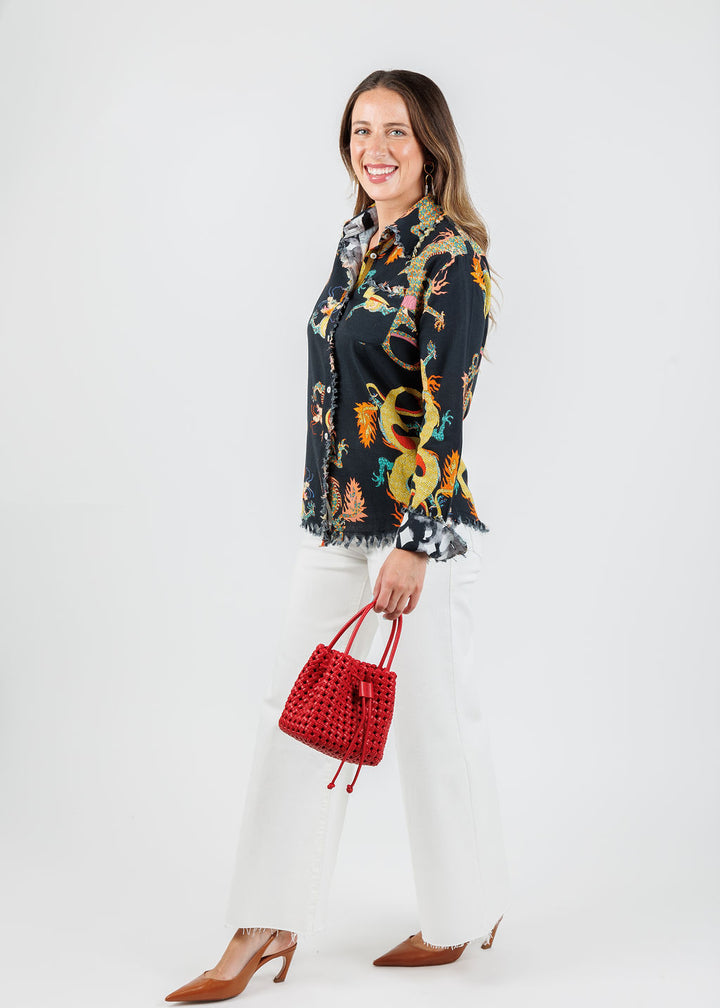 Dizzy-Lizzie Cape Cod Frayed Shirt in Black Dragon print paired with Frame Le Palazzo Crop Jeans in Au Natural Clean Raw After, Remi/Reid Perrie Mini Bucket Bag in Red available at Barbara Katz