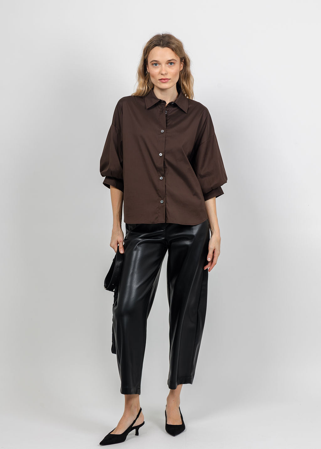 Repeat Puff Sleeve Blouse in Cocoa paired with Raffaello Rossi Phibi 7/8 Vegan Leather Pant in Black available at Barbara Katz