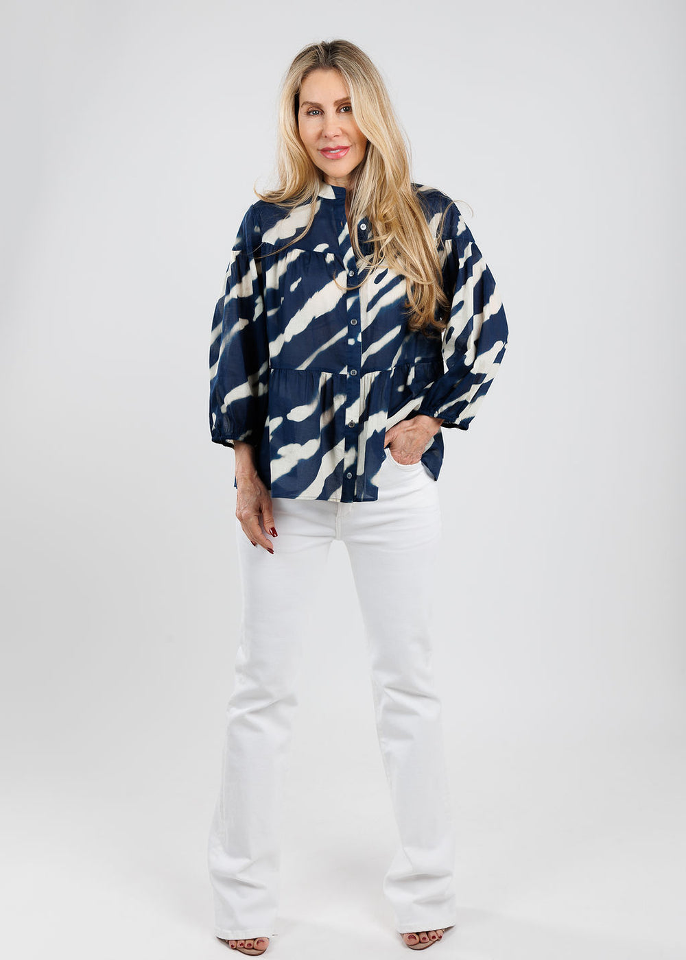 Repeat Animal Print Blouse in Marine paired with Frame Le Slim Palzzo Jeans in White available at Barbara Katz