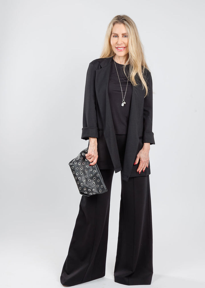 Ripley Rader Ponte Knit Short Sleeve Top & Oversized Blazer in Black paired with matching Ponte Knit Wide Leg Pants, Chan Luu Mona White Pearl Drop Silver Necklace, B-Low the Belt Gia Grommet Clutch Bag in Black Silver, available at Barbara Katz
