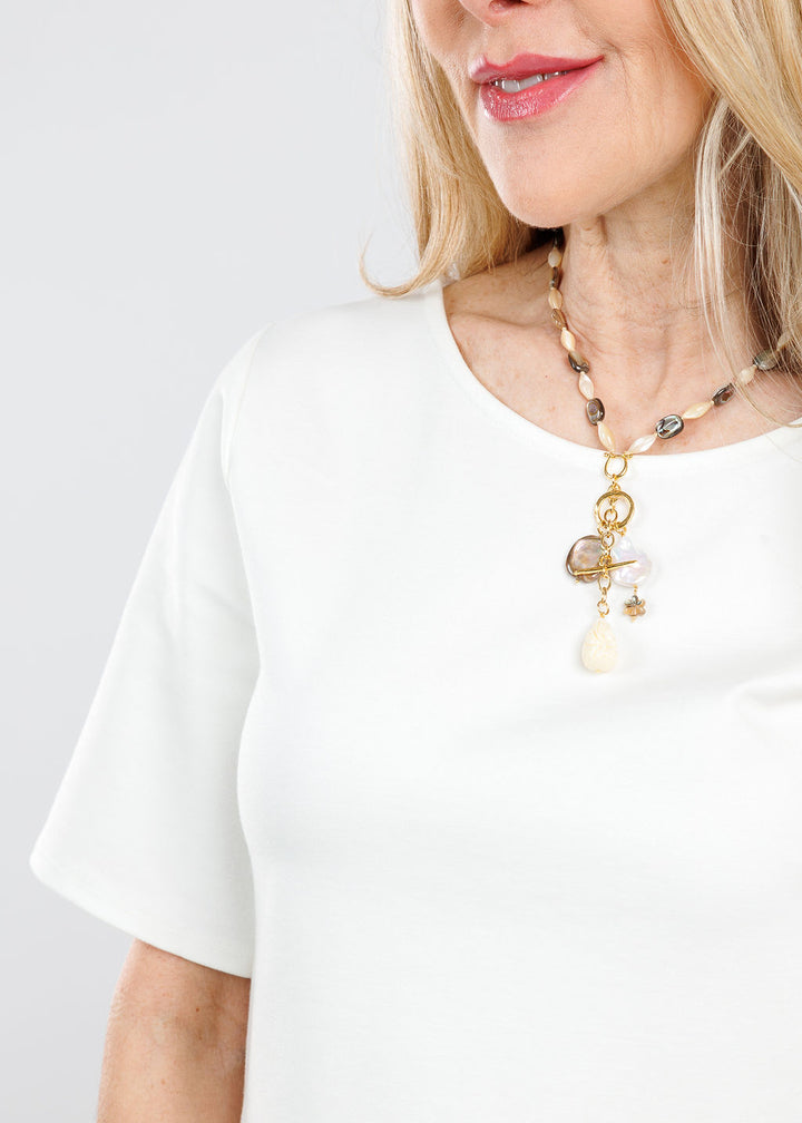Ripley Rader Ponte Knit Short Sleeve Top Extended in Off White with Chan Luu Lori Abalone Mix Necklace available at Barbara Katz