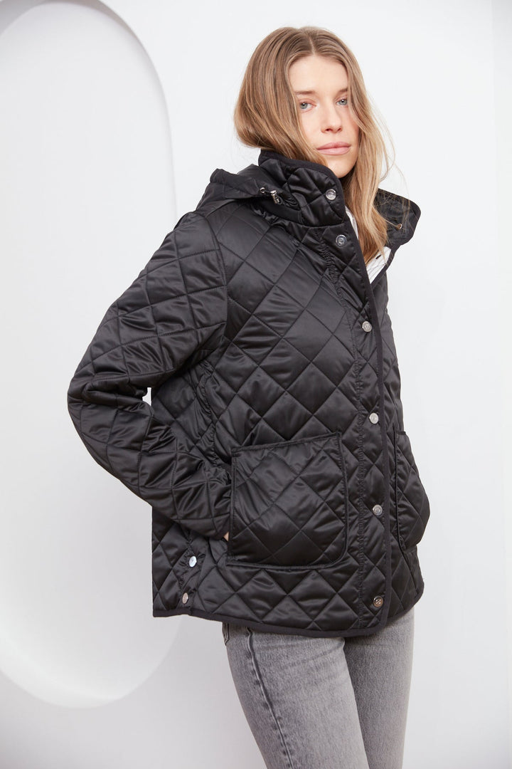 Adroit Atelier Shelby Quilted Jacket With Removable Hood in Black available at Barbara Katz