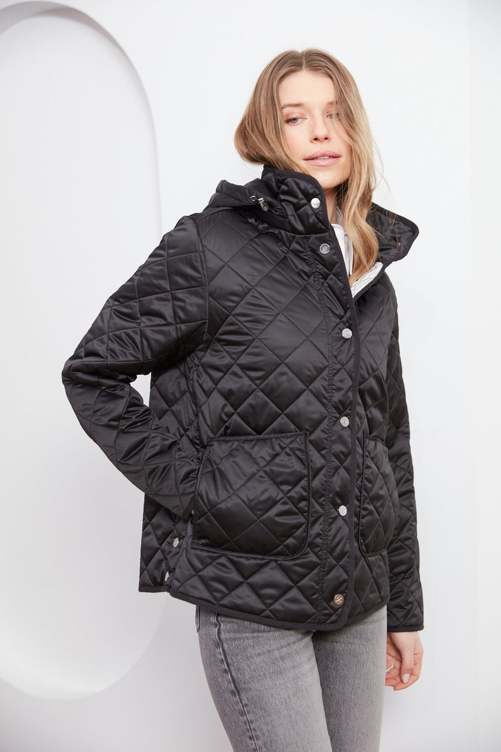 Adroit Atelier Shelby Quilted Jacket With Removable Hood in Black available at Barbara Katz