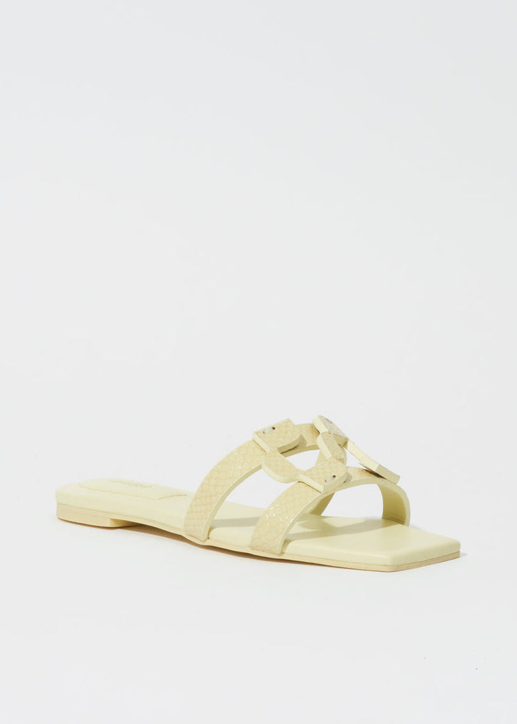 Simkhai Simkhai Monogram Snake Leather Flat Slide in Pistachio available at Barbara Katz