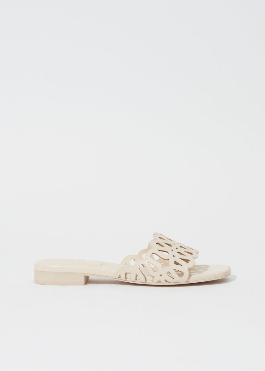 Simkhai Mccall Laser-Cut Leather Flat Slide in Cream available at Barbara Katz