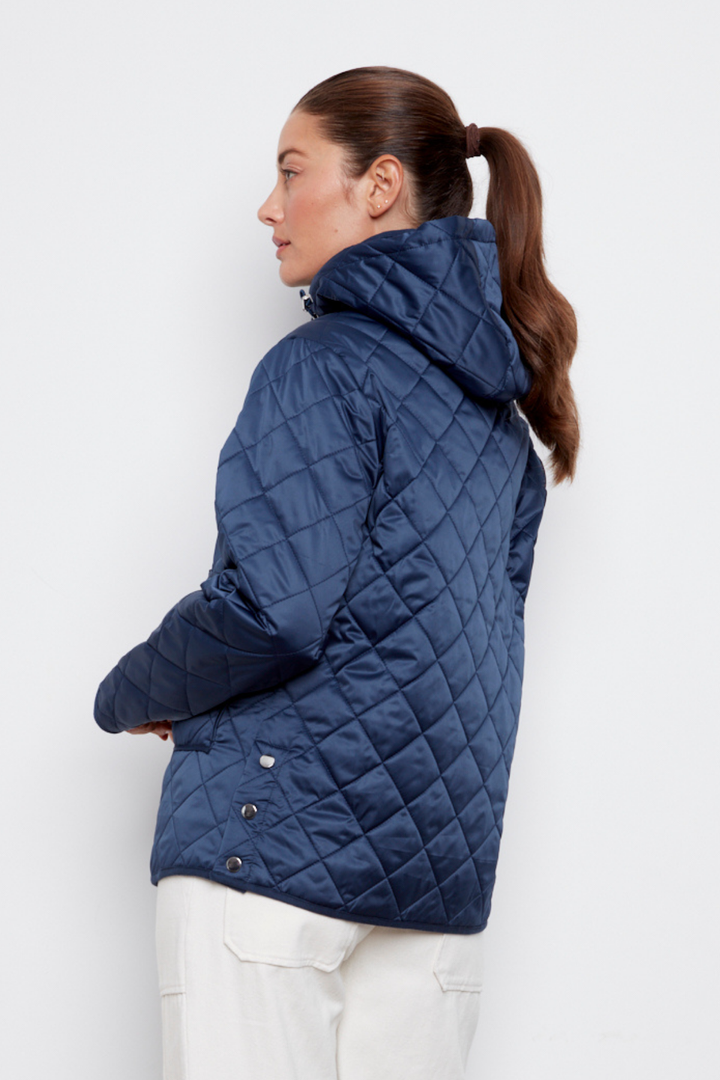 Adroit Atelier Shelby Quilted Jacket With Removable Hood in Navy available at Barbara Katz