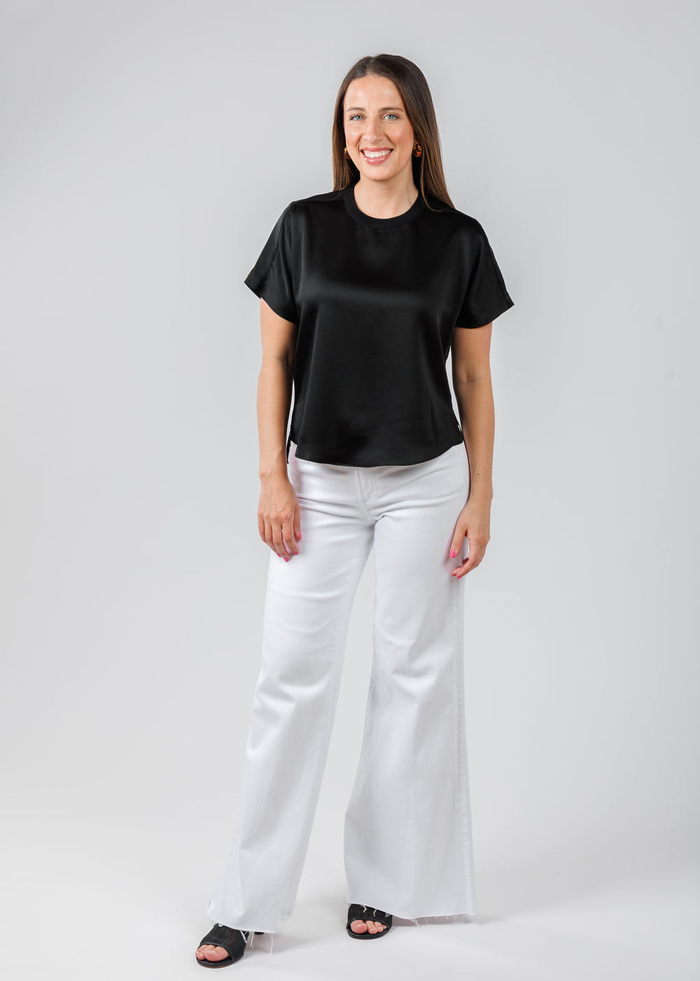 Simkhai Addy Short Sleeve Knit Back T- Shirt in Black paired with Pistola Izzy Wide Leg Crop Jeans in Vivid White available at Barbara Katz