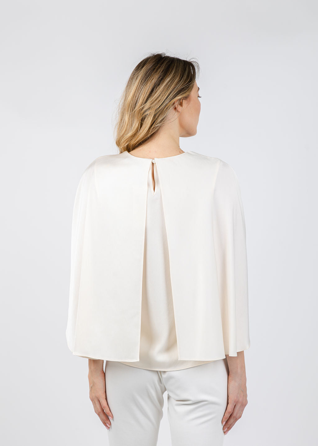 Simkhai Eliora Draped Satin Cape Top in Cream available at Barbara Katz