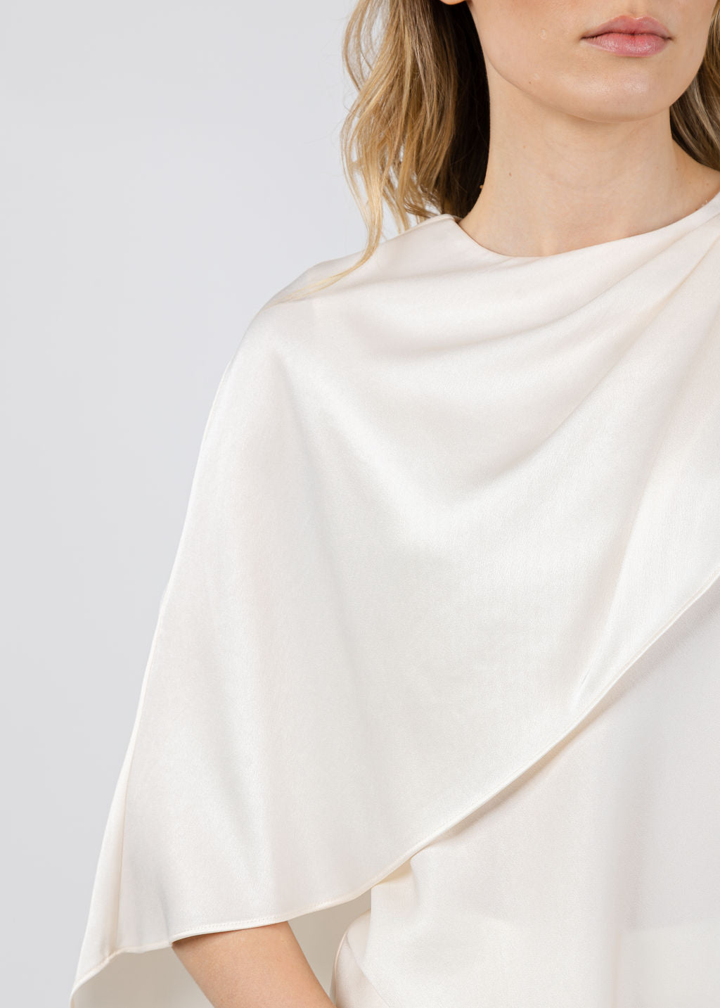 Simkhai Eliora Draped Satin Cape Top in Cream available at Barbara Katz