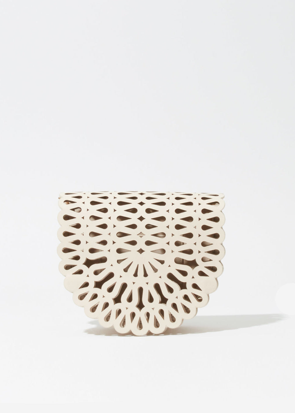 Simkhai Mccall Laser-Cut Leather Saddle Bag in Cream available at Barbara Katz