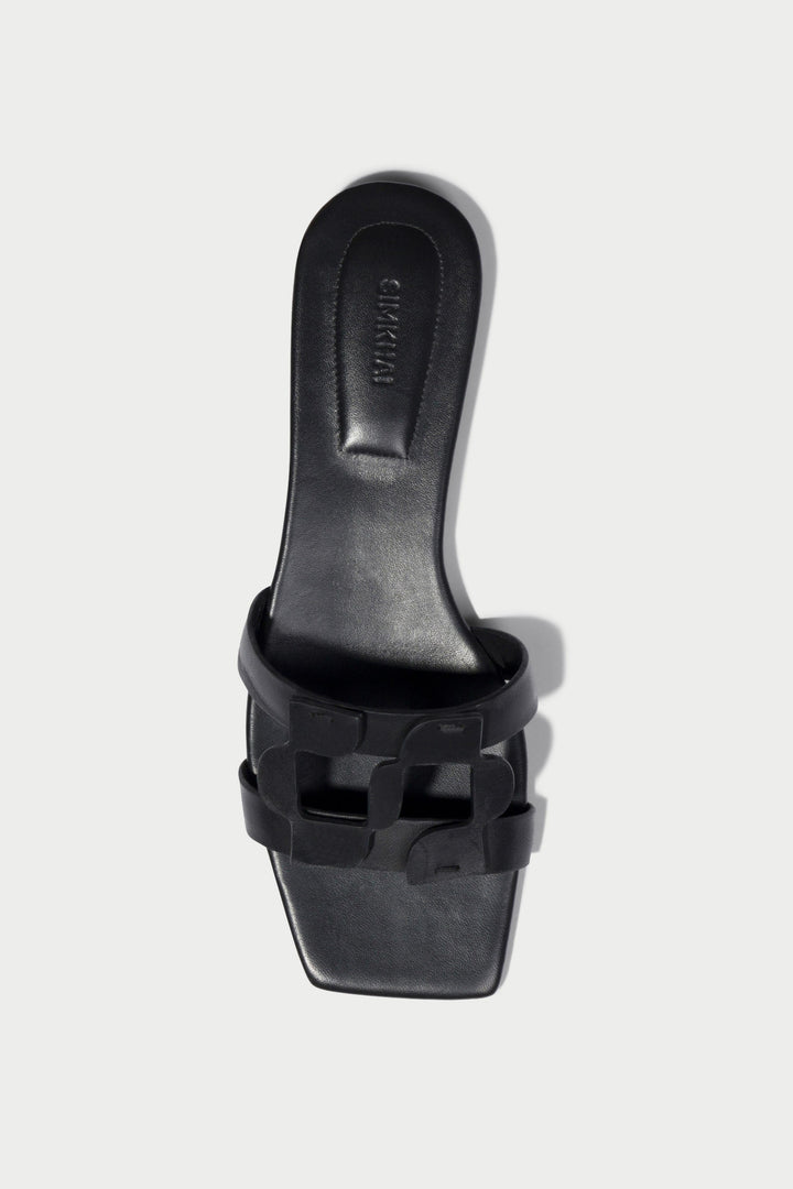 Simkhai Monogram Flat Slide in Black available at Barbara Katz