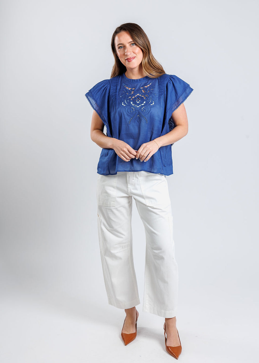 Suncoo Love Blouse in Blue paired with Pistola Denim Sabrina Barrel Cargo Pants in White available at Barbara Katz