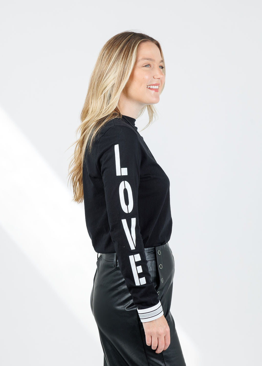 Suzy T Amelia Love Long Sleeve Top in Black available at Barbara Katz