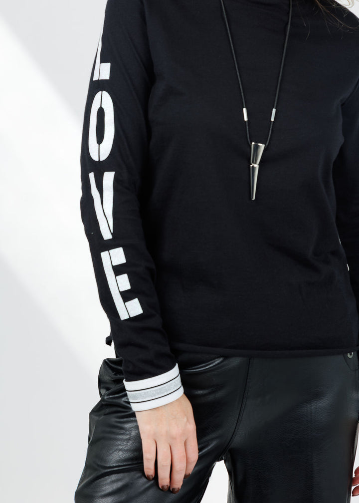 Suzy T Amelia Love Long Sleeve Top in Black available at Barbara Katz