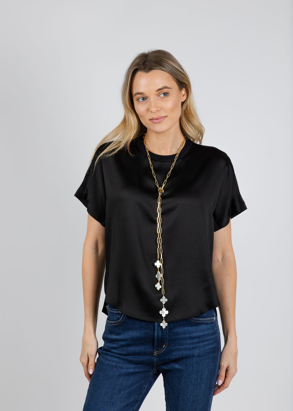 Suzy T Clover Lariat Necklace in Gold available at Barbara Katz