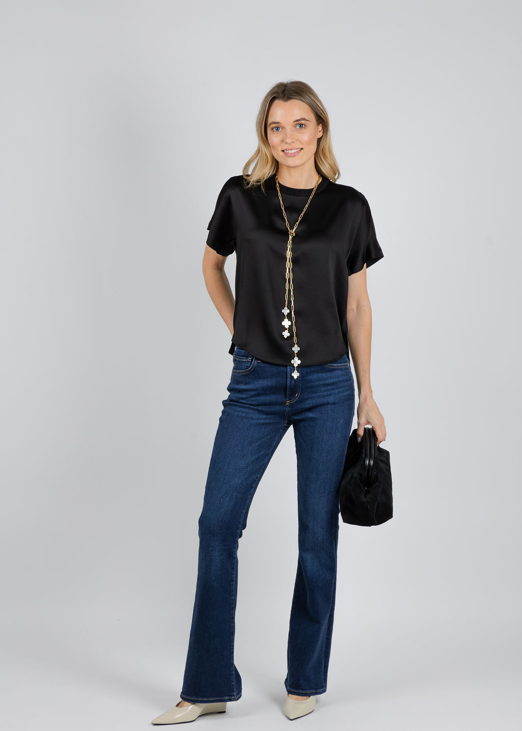 Suzy T Clover Lariat Necklace in Gold available at Barbara Katz