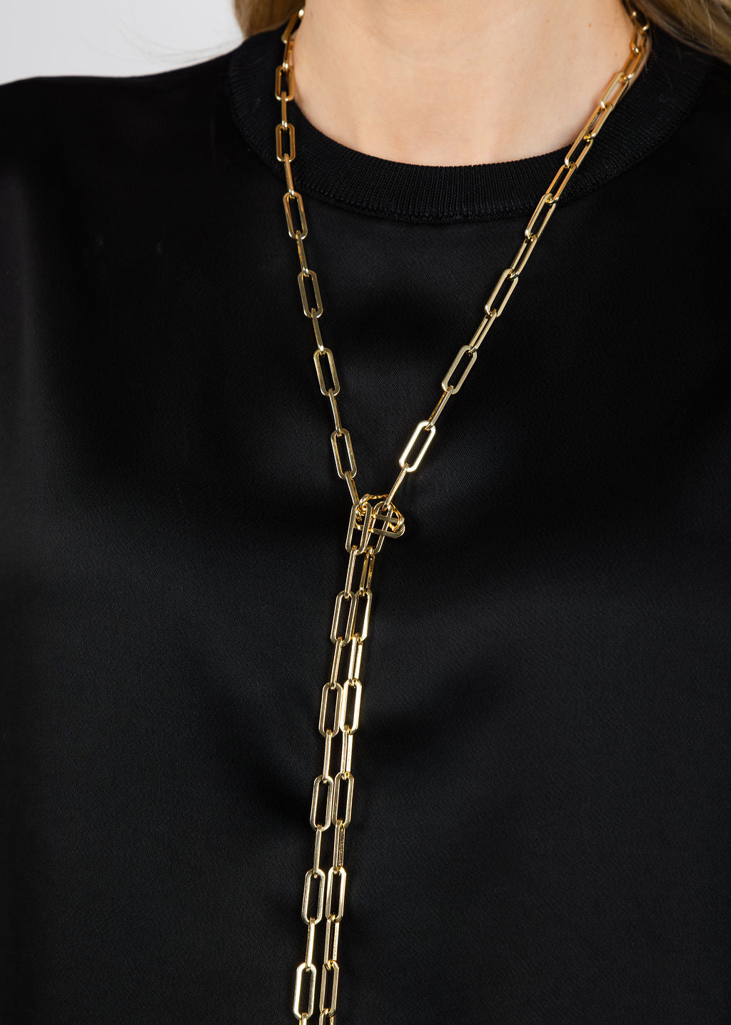 Suzy T Clover Lariat Necklace in Gold available at Barbara Katz