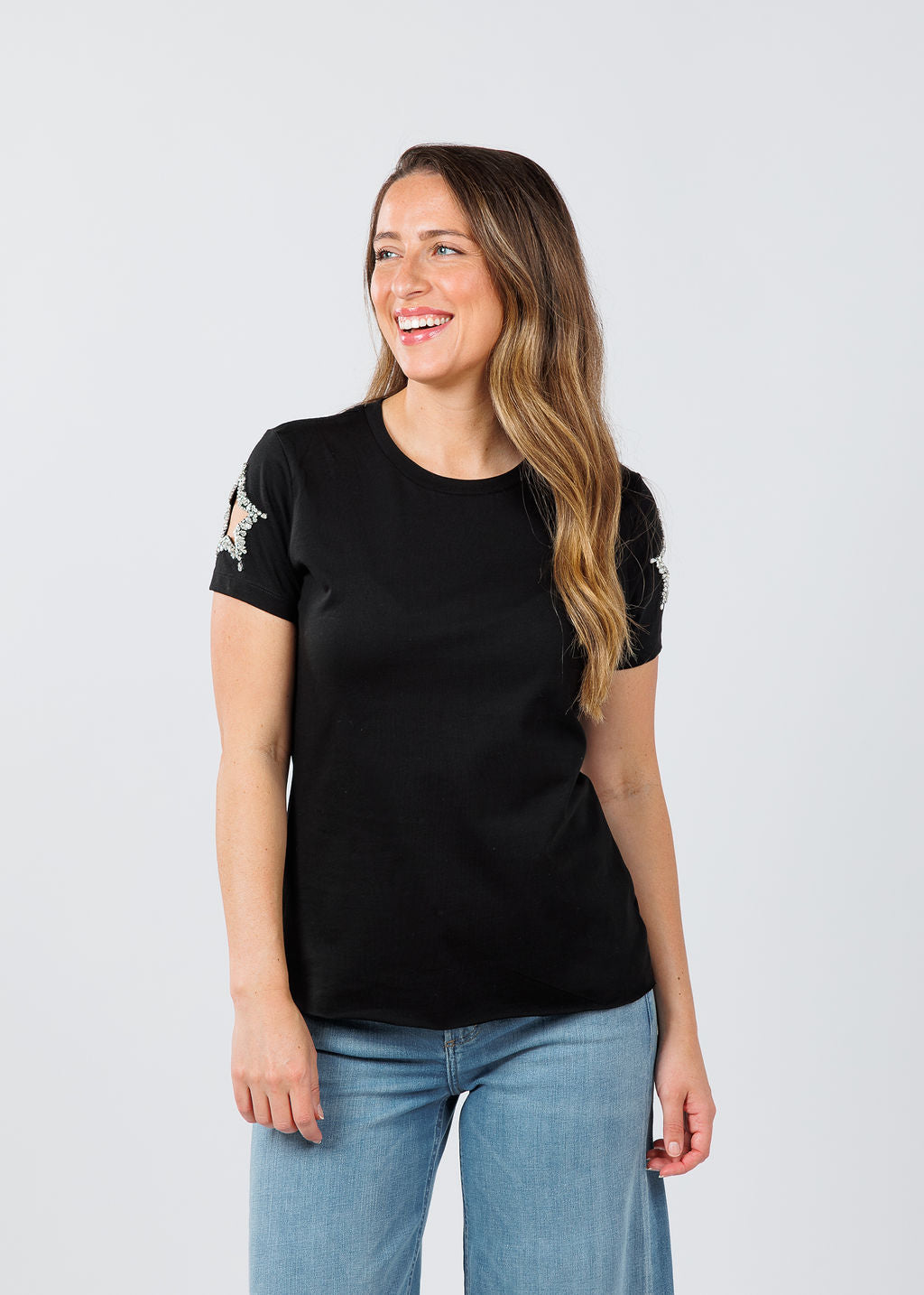 Suzy T Stars Cut Out Sleeve Top in Black available at Barbara Katz