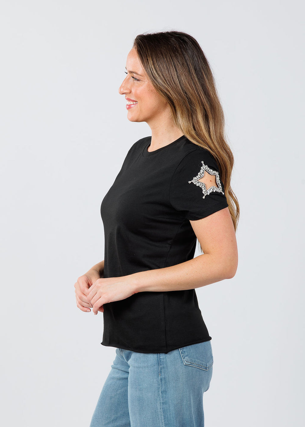 Suzy T Stars Cut Out Sleeve Top in Black available at Barbara Katz