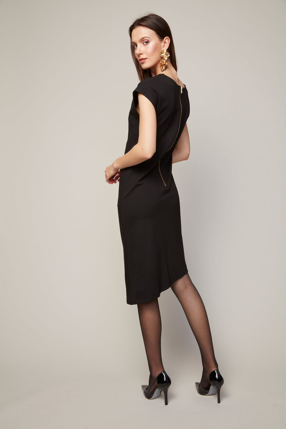 Adroit Atelier Tammy Bodycon Asymmetric Knit Dress in Black available at Barbara Katz