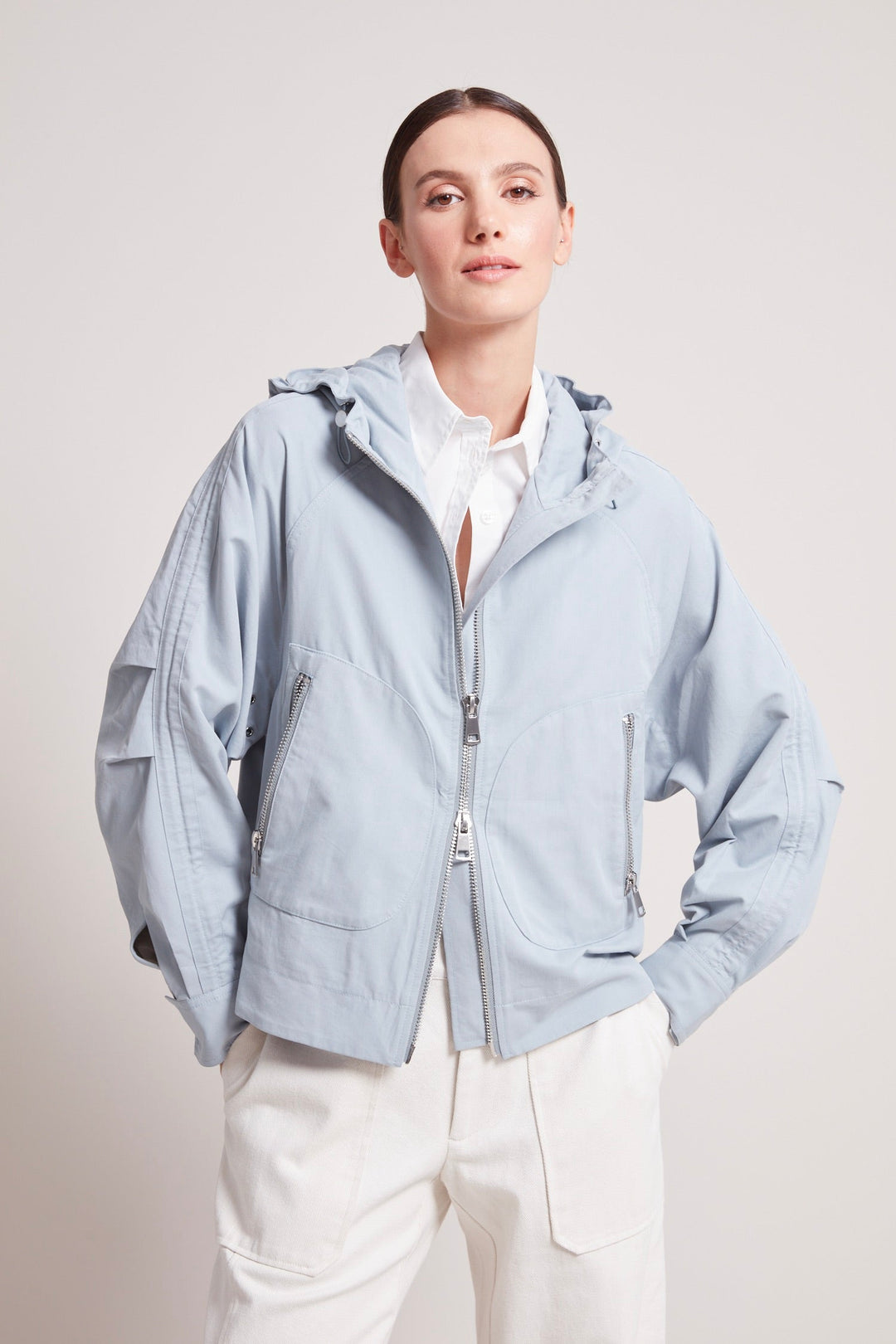 Adroit Atelier Taika Hooded Raglan Sleeve Jacket in Cloud Blue available at Barbara Katz
