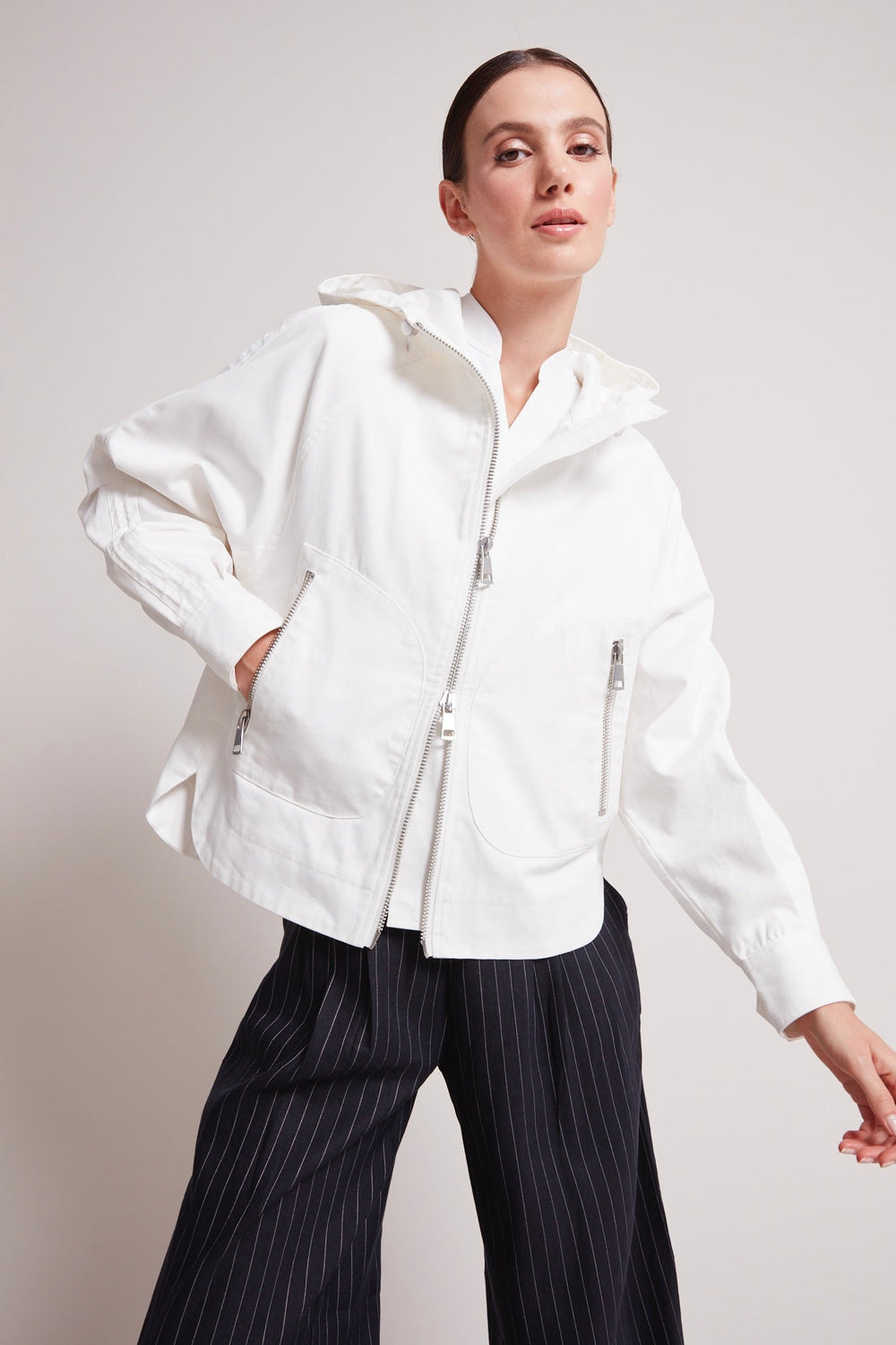 Adroit Atelier Taika Hooded Raglan Sleeve Jacket in White available at Barbara Katz