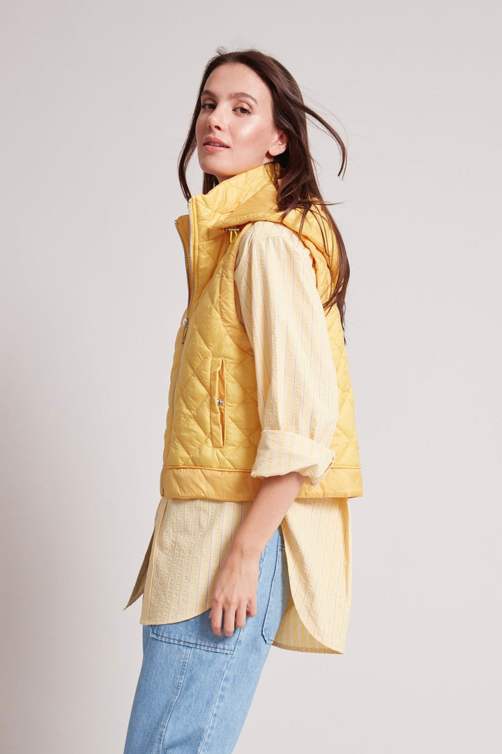 Adroit Atelier Talia Quilted Gilet With Removable Hood in Sunshine Yellow available at Barbara Katz