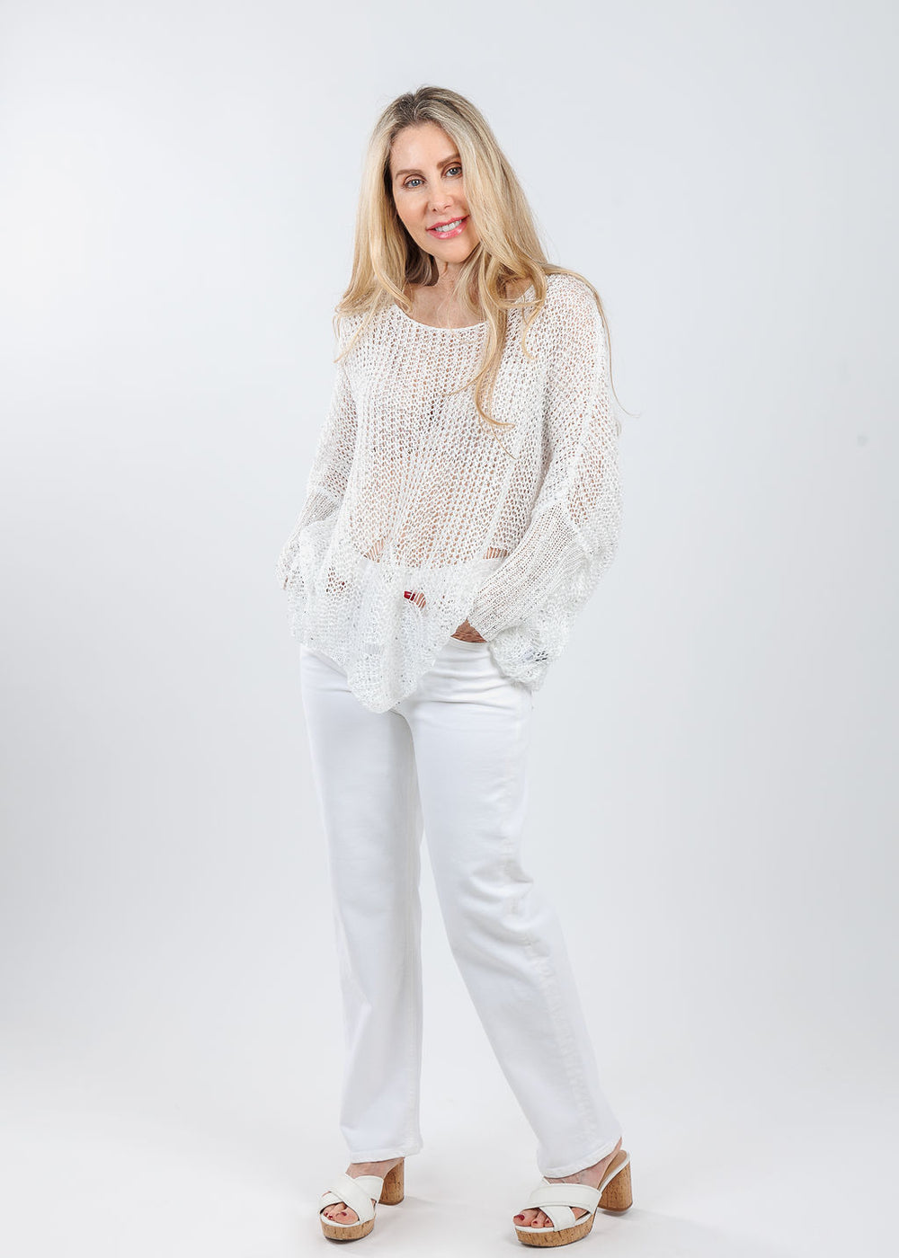 Terra Lurex Sweater in White paired with Citizens of Humanity Palma Straight Jeans in White available at Barbara Katz