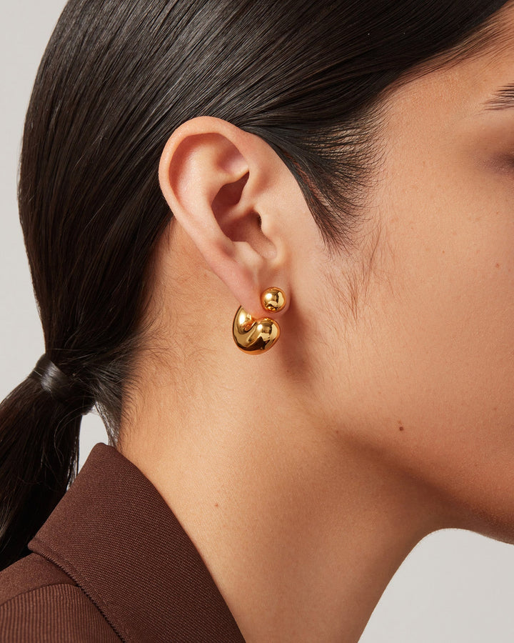 Jenny Bird Medium Tome Hoops in Gold available at Barbara Katz