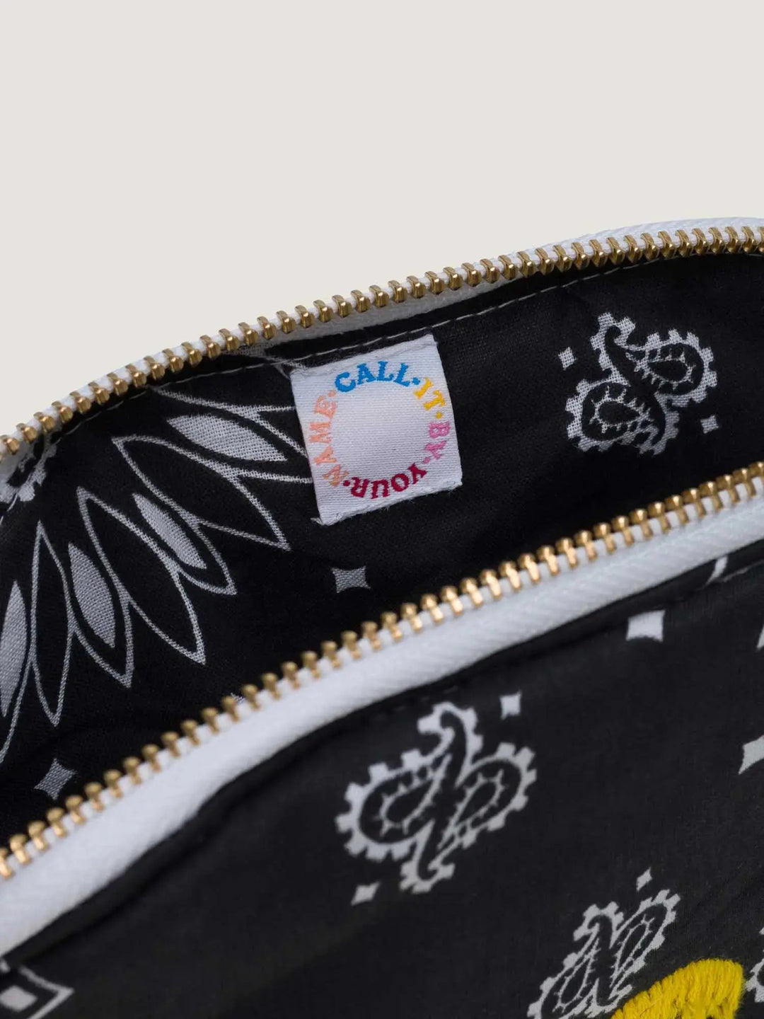 Call It By Your Name Happy Face Vanity Small in All Black available at Barbara Katz
