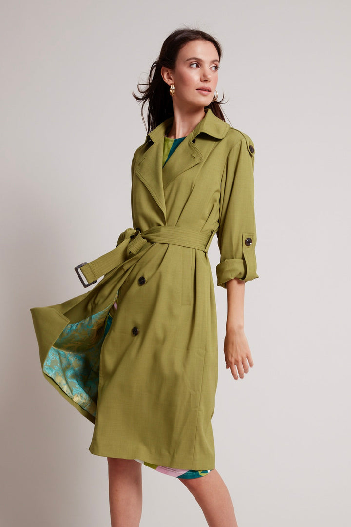 Adroit Atelier Troy Cloth Trench Coat With Inverted Back Pleat in Kiwi available at Barbara Katz