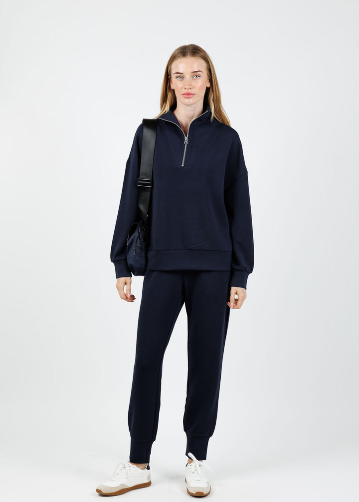 Varley Hawley Half-Zip Sweat in Navy  paired with matching The Slim Cuff Pants 27.5" available at Barbara Katz