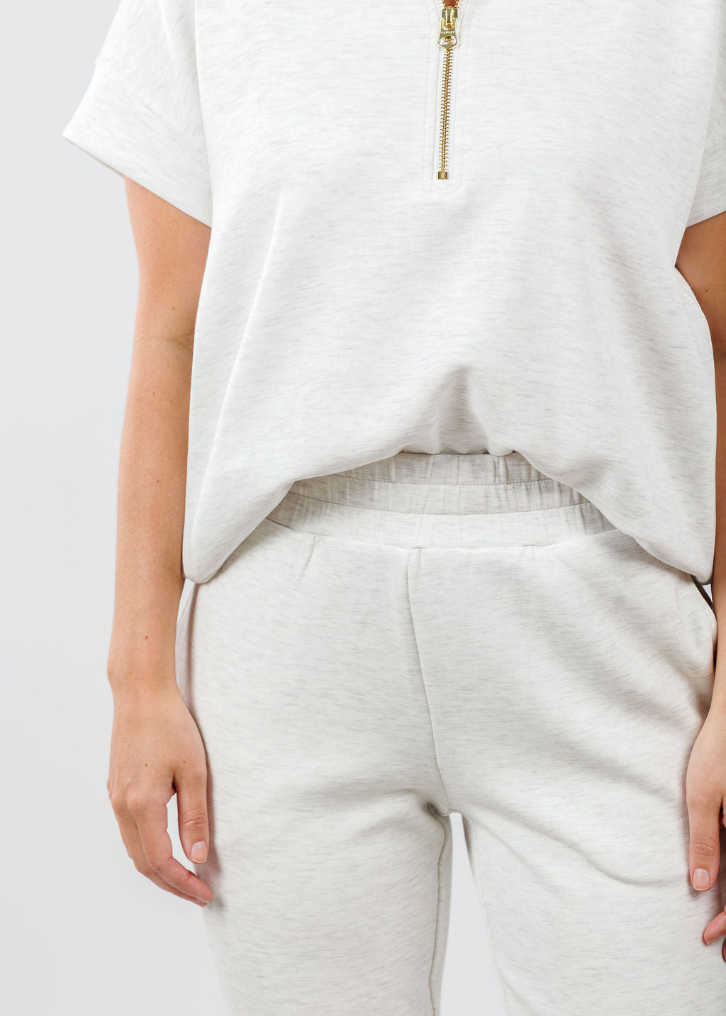 Varley Ritchie Short Sleeve Sweatshirt in Ivory Marl paired with Varley The Slim Cuff Pants 25" in Ivory Marl available at Barbara Katz 