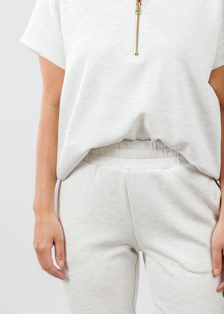 Varley Ritchie Short Sleeve Sweatshirt in Ivory Marl paired with Varley The Slim Cuff Pants 25" in Ivory Marl available at Barbara Katz 
